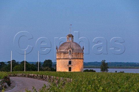 The pigeonnier of Chteau Latour at dusk with the Gironde estuary beyond Pauillac Gironde France Mdoc  Bordeaux