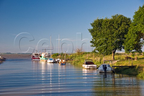 Boats moored on waterway StChristolyMdoc Gironde France