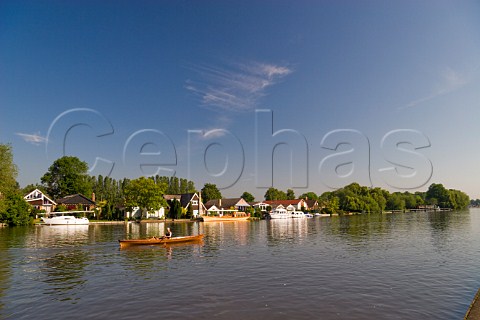 Rowing a traditional wooden skiff on the River Thames near WaltononThames