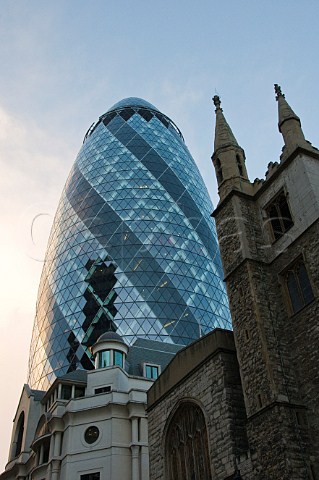 The Swiss Re tower known locally as The Gherkin in the financial district of London