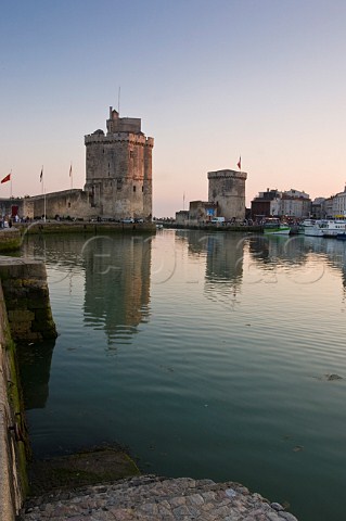 StNicholas and La Chaine towers at the entrance to the ancient port of La Rochelle CharenteMaritime France