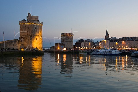 StNicholas and La Chaine towers at the entrance to the ancient port of La Rochelle CharenteMaritime France