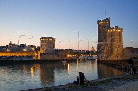 La Chaine and StNicholas towers at the entrance to the ancient port of La Rochelle CharenteMaritime France