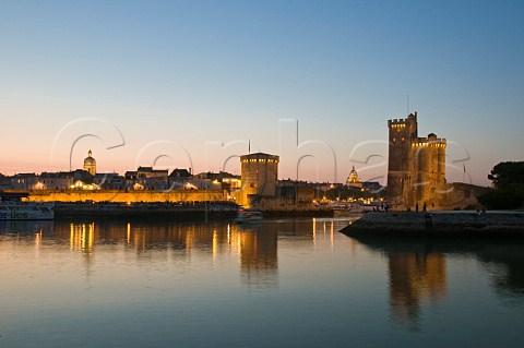 La Chaine and StNicholas towers at the entrance to the ancient port of La Rochelle CharenteMaritime France