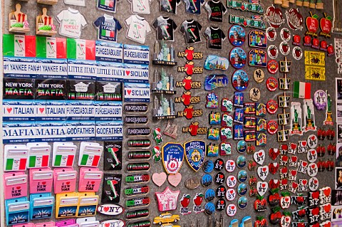 Badge and sticker display in a souvenir shop Little Italy New York USA