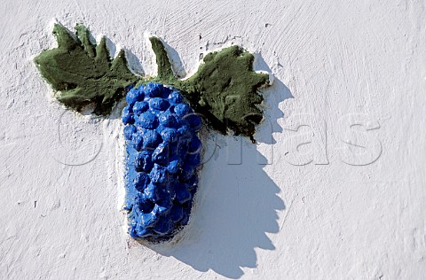 Detail of bunch of grapes adorning a house Palkonya Hungary Villany