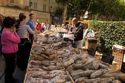 Saucisson on sale at the Sunday market in LIslesurlaSorgue Vaucluse Provence France