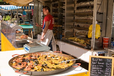Prepared dish of paella at the daily produce market in Cavaillon Provence France