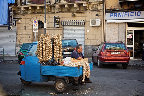 Garlic on sale from truck in Mercato del Capo Palermo Sicily