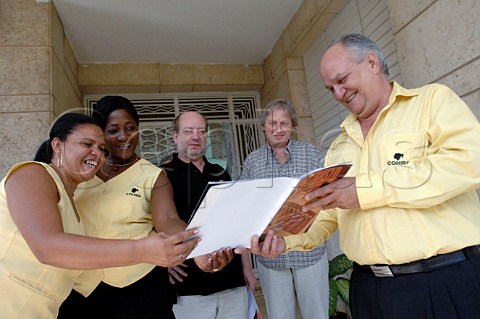 Former director Rafael Collazo Cabrera  with workers at the Cohiba cigar factory Havana Cuba