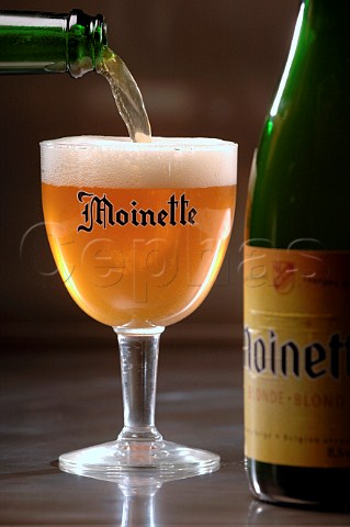 Pouring glass of Moinette Belgian beer