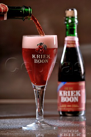 Pouring glass of Kriek Boon Belgian fruit beer