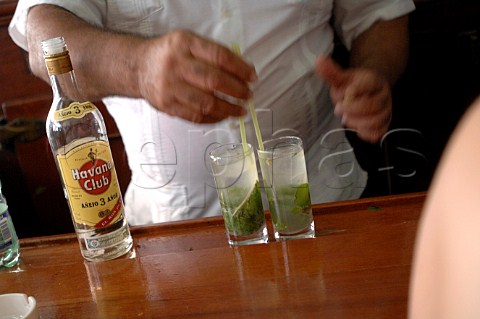 Barman making Mojito cocktails  Havana Cuba