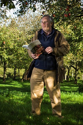 James Crowden Poet and author of Ciderland a book on West Country Cider in Julian Temperley Cider orchard   Burrow Hill Kingsbury Episcopi Somerset England