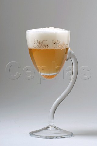 Glass of Mea Culpa Blond Belgian beer