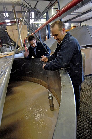 Measuring alcohol content at Tullibardine distillery Blackford Perthshire Scotland
