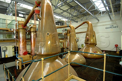 Copper pot stills of The Glenlivet whisky distillery Ballindalloch Banffshire Scotland Highland
