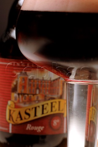 Glass and bottle of Kasteel Rouge Belgian beer