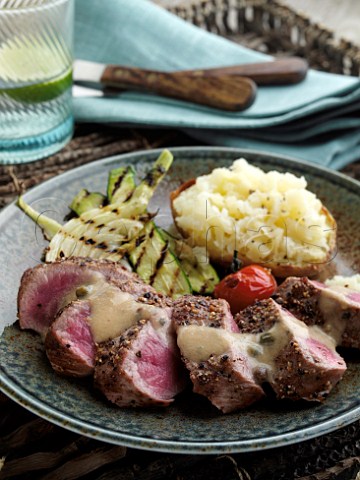 Lamb loin with a baked potato and celeriac