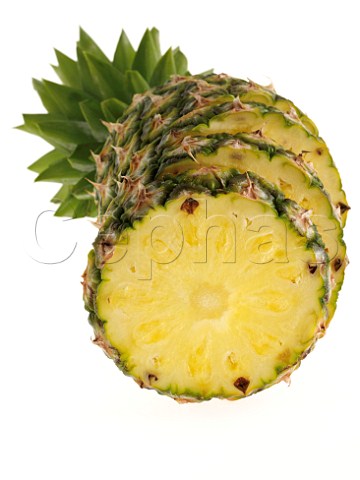 A cut pineapple on a white background