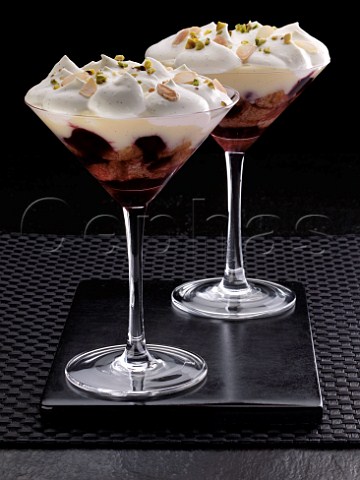 Two martini glasses of trifle