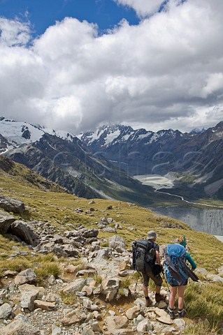 Hikers on trail to Mueller Hut Mt Cook  Aoraki National Park South Island New Zealand