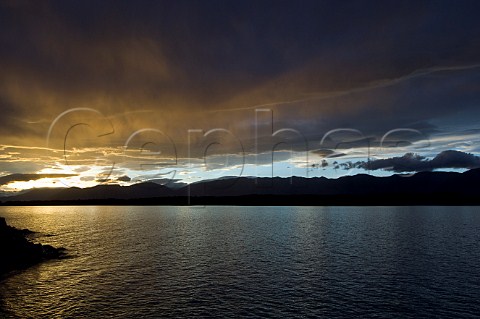 Storm clouds at sunset Lake Pukaki South Island New Zealand