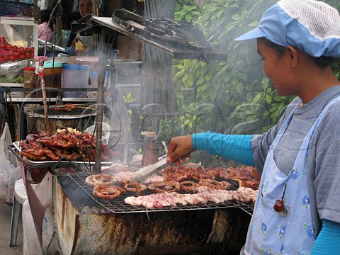 Openair barbeque in a street market Bangkok Thailand