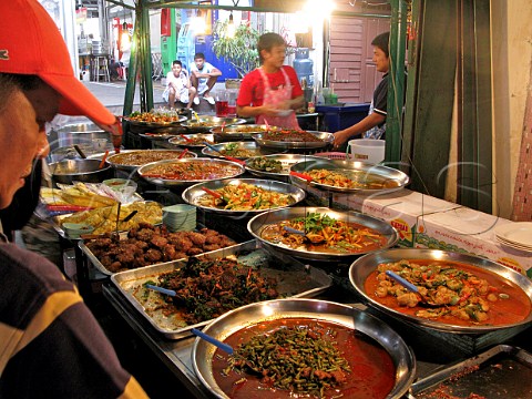 Hot food stall at a Bangkok market Thailand