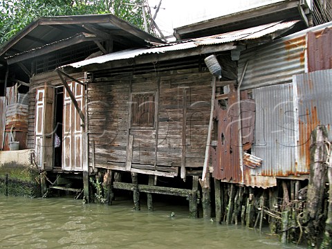 Wooden house built on the Chao Phraya river Bangkok Thailand