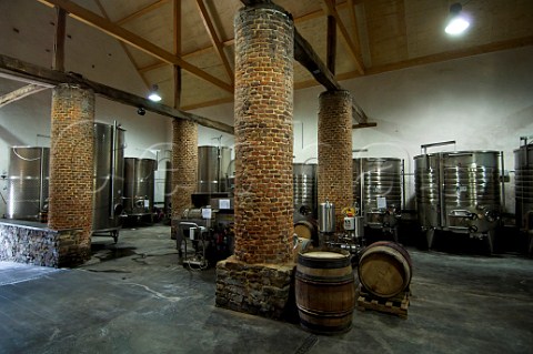 Steel fermentation tanks in cellars at Domaine du Chenoy Emines Belgium