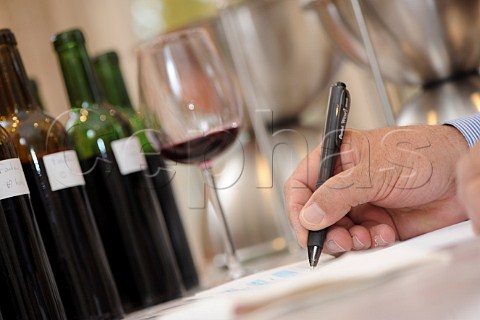 Making notes at a wine tasting