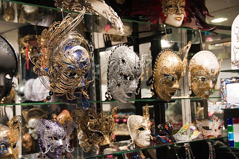 Face masks on display in shop window Murano Venice Italy