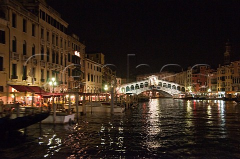 Rialto bridge and Grand Canal at night Venice Italy