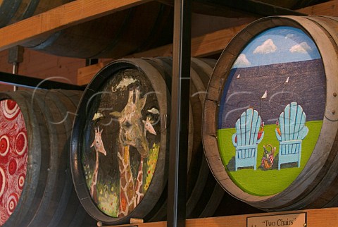 Barrel ends painted by artists who have shown their work at the tasting room of Urban Wine Works  Portland Oregon USA