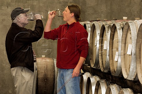 Winemakers Terry Casteel and son Ben in the barrel cellar at Bethel Heights winery  Salem Oregon USA  Willamette Valley