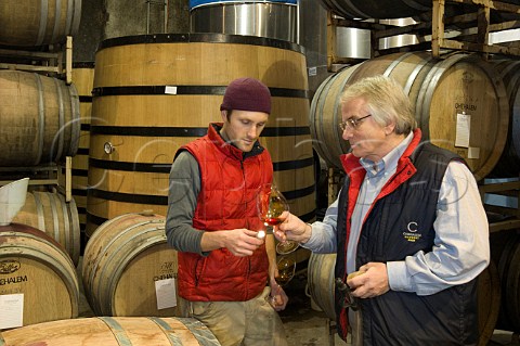 Winemakers Mike Eyres and Harry PetersonNedry in barrel cellar of Chehalem Winery  Newberg Oregon USA  Willamette Valley