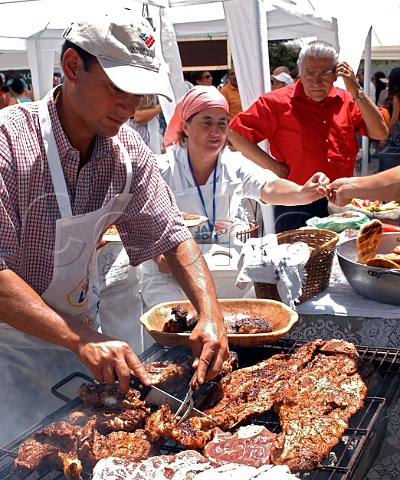 Cooking beef on the barbecue during La Fiesta de la Vendimia   Santa Cruz Colchagua Valley Chile
