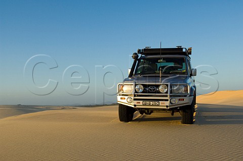Toyota Landcruiser on dune at Stockton Beach Newcastle New South Wales Australia