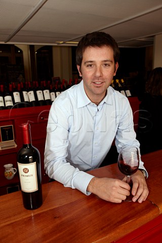 Cristian Aliaga head winemaker of Veramonte with a bottle of his Primus  Casablanca Valley Chile