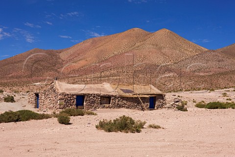 House made of local rock near village of Machuca  at over 4000 metres altitude in the Atacama Desert Chile