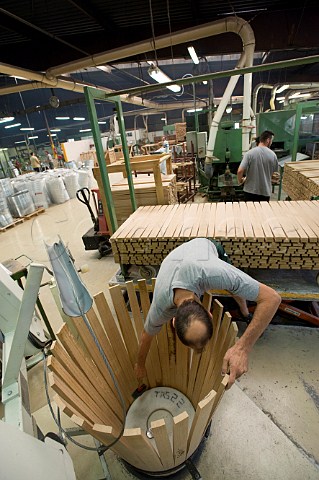 Essencia barriques being assembled in the cooperage of Demptos from their socalled Intelligent range of barrels  Bordeaux Gironde France