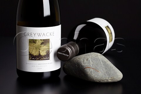 Bottles of Greywacke Sauvignon Blanc 2009 with Greywacke rock from the vineyard   Marlborough New Zealand