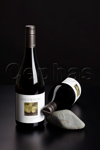 Bottles of Greywacke Sauvignon Blanc 2009 with Greywacke rock from the vineyard  Marlborough New Zealand