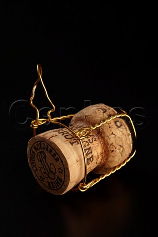 Cork and wire cage from bottle of Louis Roederer Champagne