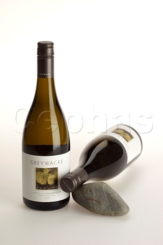 Bottles of Greywacke Sauvignon Blanc 2009 with Greywacke rock from the vineyard  Marlborough New Zealand