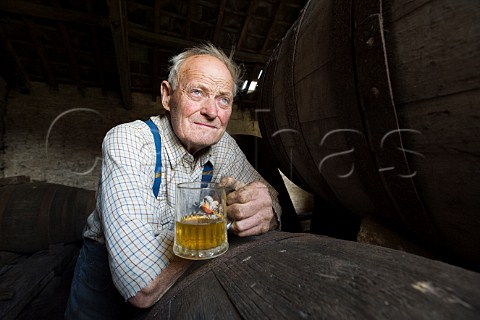 Cider maker Frank Naish aged 85 in his cider barn near Glastonbury Somerset England
