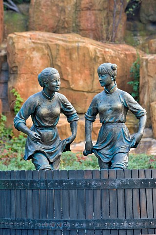 Bronze sculpture of women treading grapes in a press Chateau Changyu AFIP Global winery Ju Gezhuang Beijing Miyun County China
