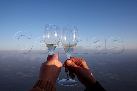 Glasses of Champagne at around 7000 feet in the Taittinger hotair balloon during their altitudinal Champagne tasting to research the affect of altitude on the taste and bubbles