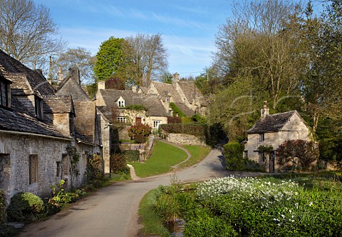 Arlington Row and Awkward Hill in the village of Bibury Gloucestershire England